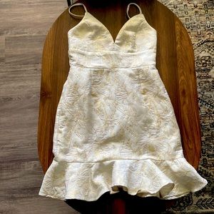 Thigh length gold and cream spaghetti strap dress